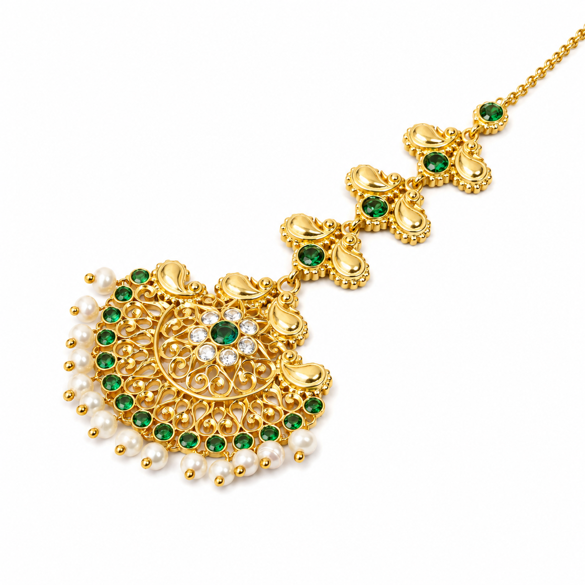 Gold-toned traditional necklace with a large ornate pendant, green stones, white pearl-like beads, and a chain on a plain white background.